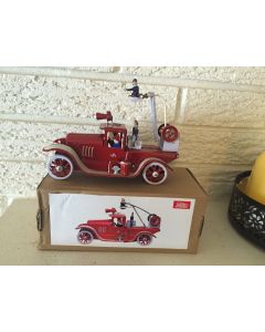 The old fashioned Fire Ladder Truck is a classic wind up all tin toy New DL 