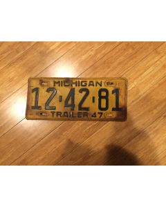 Antique Michigan License Plate 1947.  "Trailer  47"  On Bottom. Michigan On Top Black on orange.  Single plate issued. Condition as Pictured.  12-42-81