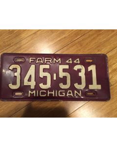 Antique Michigan License Plate Farm 1944 345-531. White on maroon, "Farm 44" on top—"MICHIGAN" on bottom  Single Plate Issued.   Condition as Pictured.  