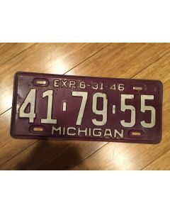 Antique Michigan License Plate 1946 41-79-55. White on dark olive green, "46" on top—"MICHIGAN" on bottom  Single Plate Issued.   Condition as Pictured.MICHIGAN" on bottom  Single Plate Issued.   Condition as Pictured.