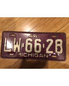 Antique Michigan License Plate 1944 LW-66-28. White on maroon, "44" on top—"MICHIGAN" on bottom