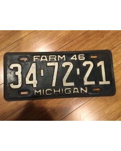 Antique Michigan License Plate Farm 1946 34-72-21. White on dark olive green, "Farm 46" on top—"MICHIGAN" on bottom  Single Plate Issued.   Condition as Pictured.